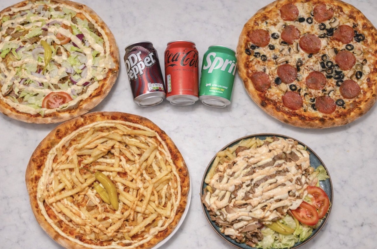 A spread of Swede Stop pizzas and sides